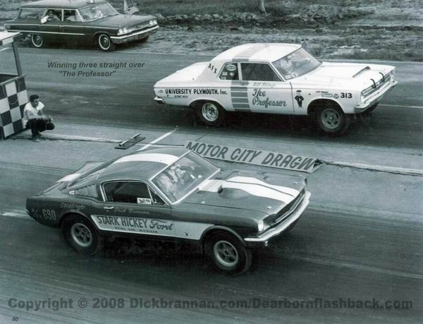 Dark 1967 Ford Mustang drag car with white stripes and 'Stark Hickey Ford' text, angled from the front-right