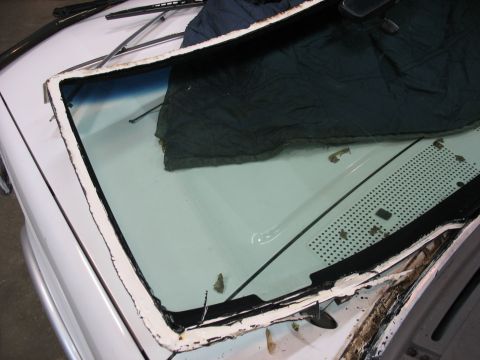 1995 Ford C-350 (Centurion Conversions) - The windshield has been removed from the vehicle, revealing the interior and the surrounding frame.