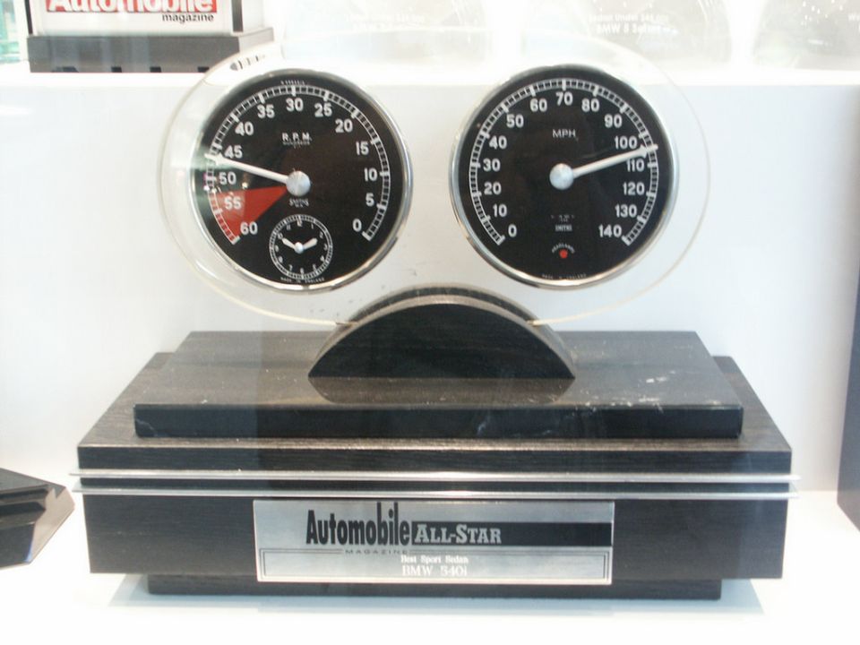 Automobile Magazine All-Star trophy for BMW 540i with tach and speedometer gauges