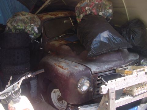 1979 Ford Bronco - This vehicle appears to be an older model car, possibly from the 1940s or 1950s, in a state of disrepair.