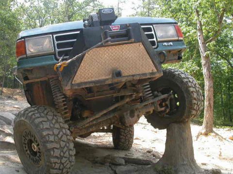 1990 Ford Bronco - This 1990 Ford Bronco is tackling a tough off-road obstacle.