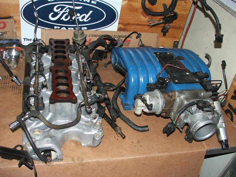 Ford engine intake manifold and throttle body assembly with wiring