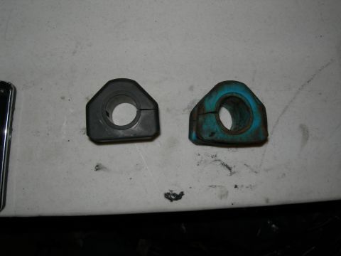 1992 Ford Taurus - Comparison of old and new sway bar bushings.