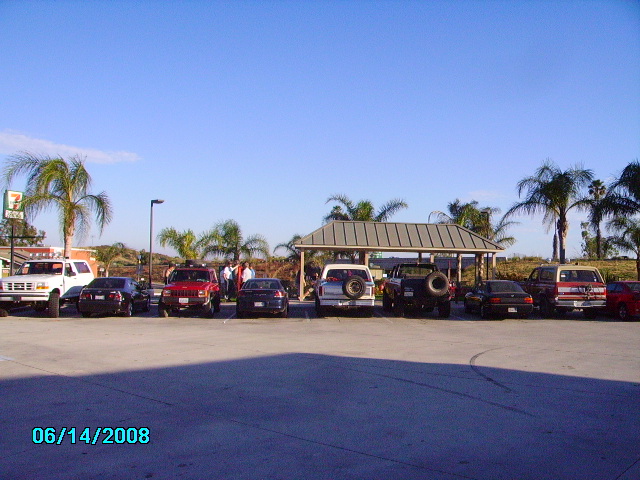 1990 Ford Bronco parked with other vehicles