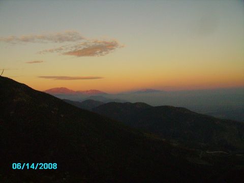 1990 Ford Bronco - A scenic view of mountains at sunset, captured on 06/14/2008, with a Supermotors watermark.