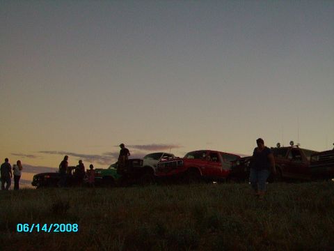 1990 Ford Bronco - Group of vehicles gathered on a hill at dusk, with a date stamp of 06/14/2008 visible.