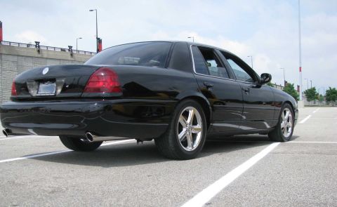2003 Mercury Marauder - Black 2003 Mercury Marauder seen from the rear quarter angle in a parking lot.