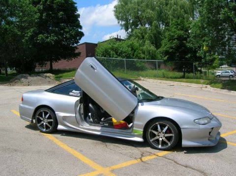 1994 Mazda MX-6 - Another angle of the car with one (so far) lambo door up