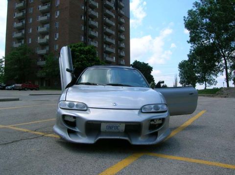 1994 Mazda MX-6 - Front shot with one door up and one door open