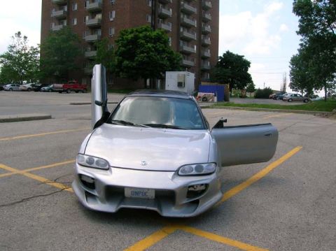 1994 Mazda MX-6 - Two doors... Two different ways to open them lol