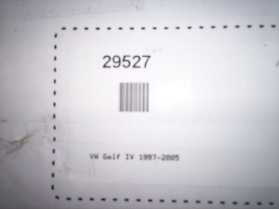 Document showing barcode and text 'VW Golf IV 1997-2005'