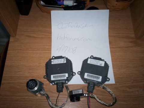 1993 Ford Probe - HID ballasts and igniter are shown on a table next to a handwritten note.