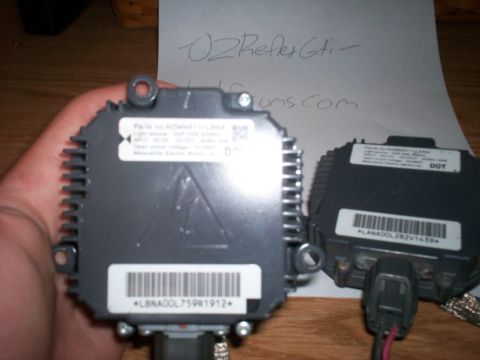 1993 Ford Probe - Two automotive headlight ballasts are shown, one in a hand, with visible part numbers and labels.