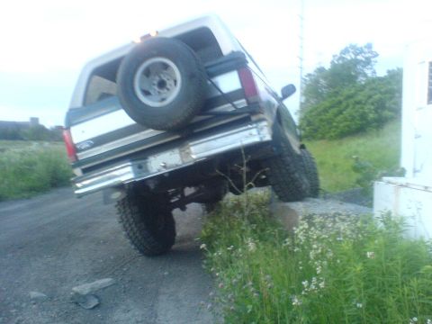 1985 Ford Bronco - This 1985 Ford Bronco is positioned on an incline, with its rear facing the camera.