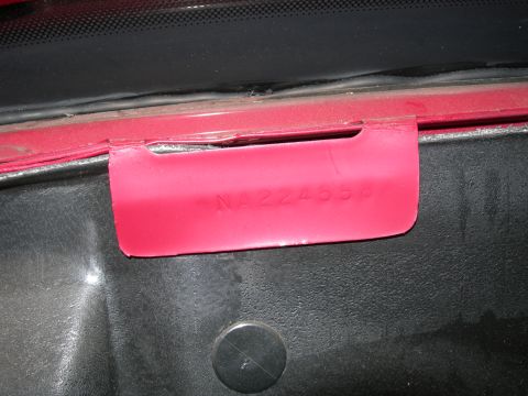 1992 Ford Taurus - A red VIN tag with embossed characters is visible in the engine bay.