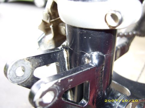 1972 Ford Ranchero - This close-up shows the mounting bracket for a bicycle's rear derailleur, with visible bolts and metal components.
