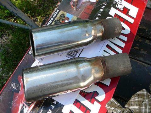 1997 Mercury Grand Marquis - Two exhaust tips are shown, likely for an engine swap, with visible rust at their connection points.