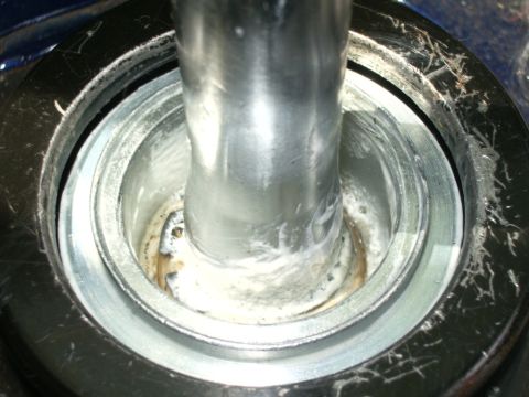 1995 Ford Probe - The image shows a close-up view of a vehicle's gear shifter mechanism, likely during a modification or repair.