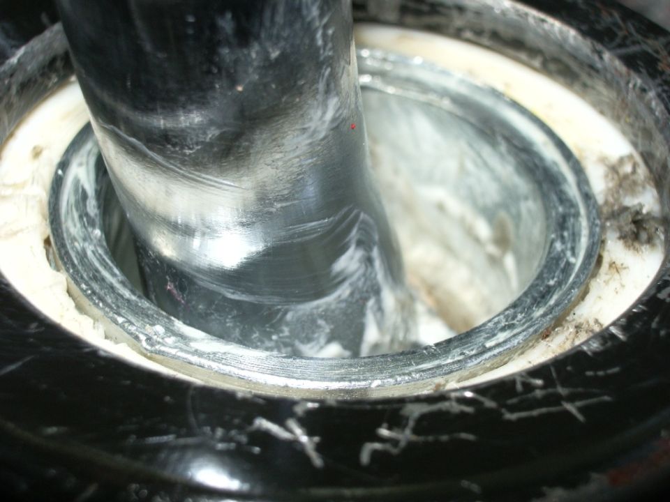 Close-up of shifter lever in housing with grease