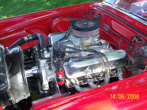 1972 Ford Ranchero - Customized engine bay chrome accents and an aftermarket air intake system.