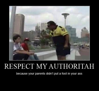2000 Mercury Grand Marquis - A police officer appears to be scolding two young people in an urban setting.