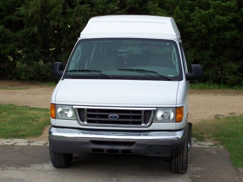 2006 Ford E250 - Front view of a white 2006 Ford E250 van with a high-top roof.