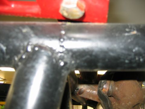 1992 Ford Mustang - Close-up view of a welded metal frame section, showing the welding work.