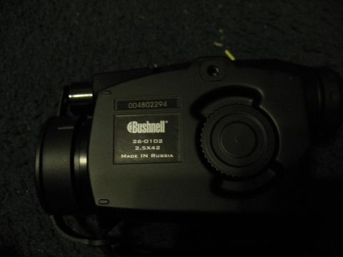 1997 Ford Crown Victoria - Bushnell night vision monocular with model number 26-0102 and magnification 2.5x42.