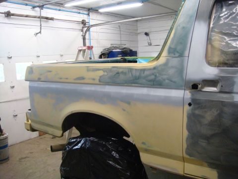 1996 Ford Bronco - This 1996 Ford Bronco is undergoing body repair, with filler visible on the rear quarter panel.