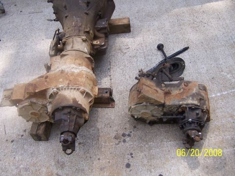 1979 Ford F-150 - Two old, rusty transfer cases are shown side-by-side on a concrete surface. A date stamp indicates the photo was taken on June 20, 2008.