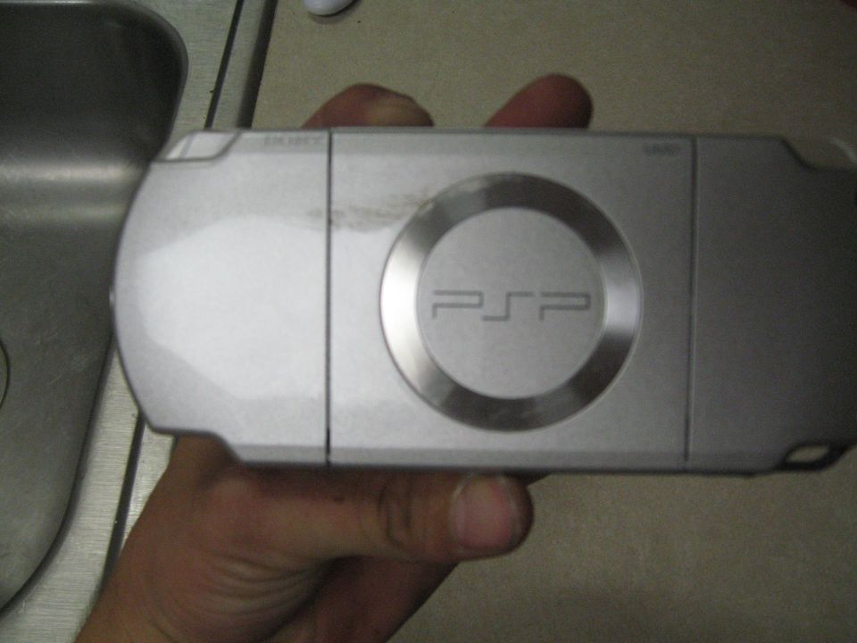 Silver Sony PSP handheld gaming console