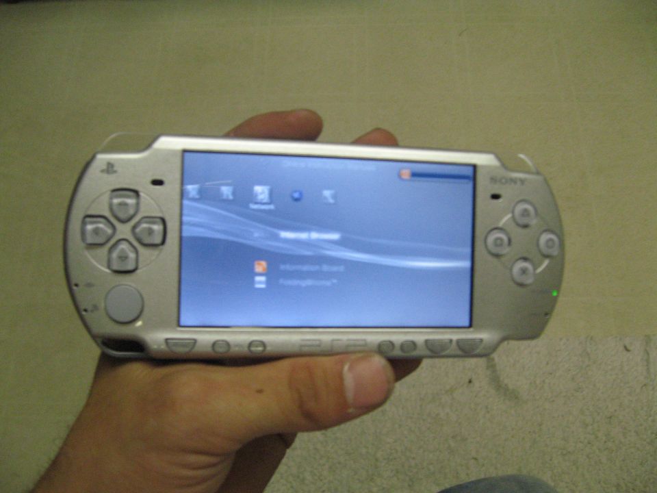 Silver Sony PSP handheld gaming console