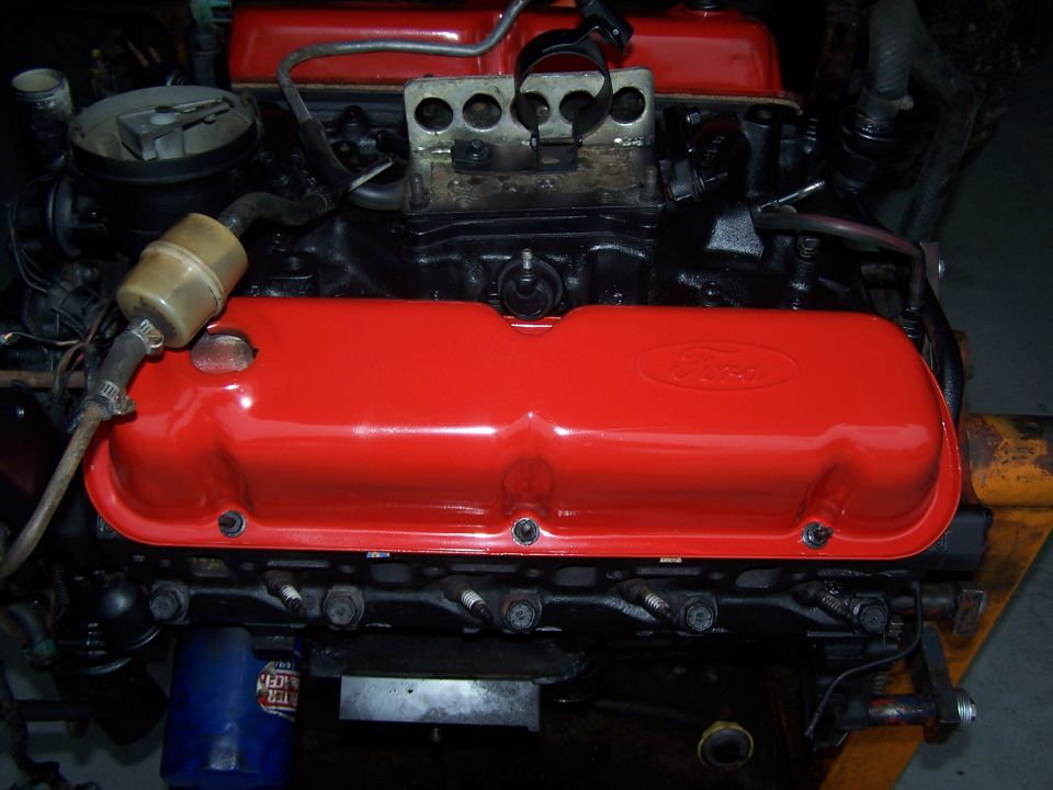 Ford V8 engine with red valve cover