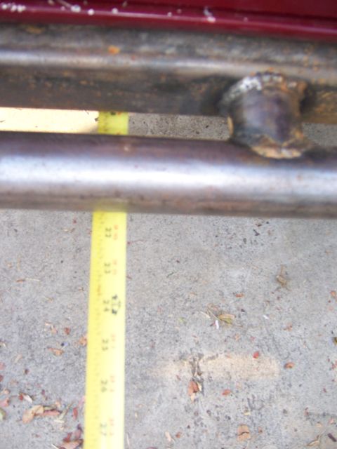 1991 Ford Bronco - Photograph of a fabricated steel tube structure with a yellow tape measure used to measure it.