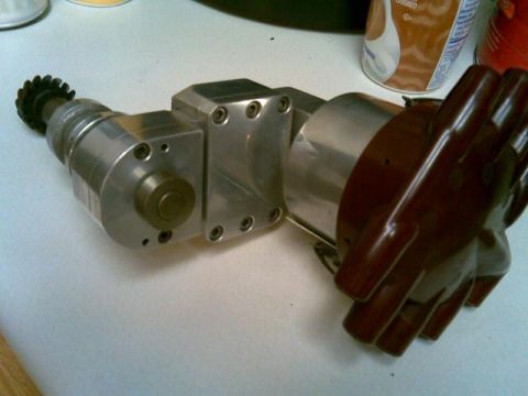 1972 Ford Ranchero - the 6 screw cover is a clamp that holds tension adjustment on the cogged timing belt inside