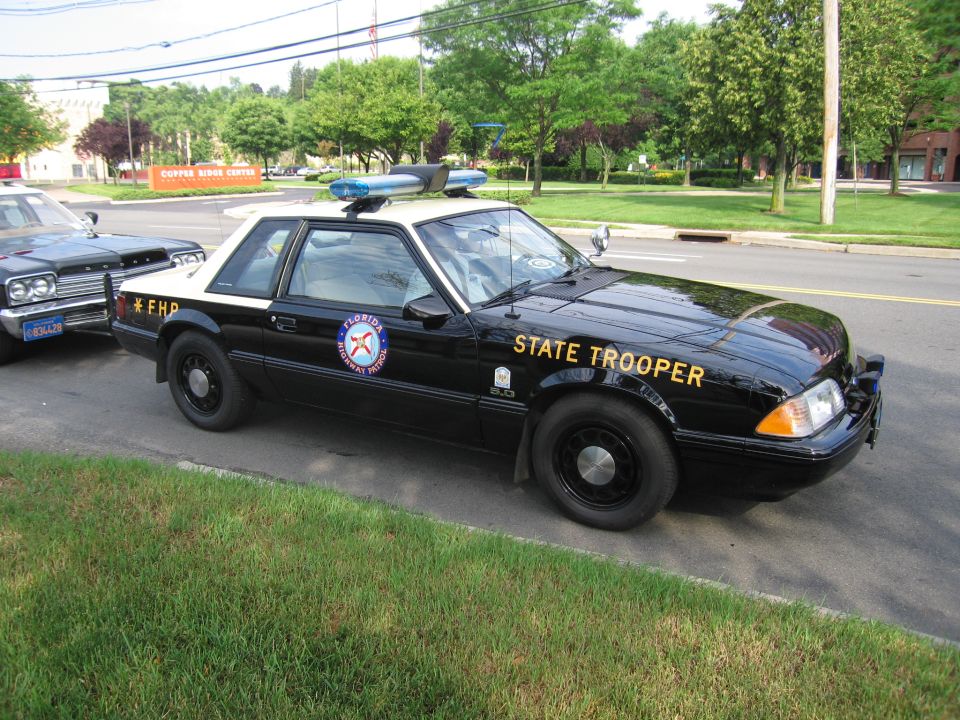 Black Fox-body Mustang coupe marked Florida Highway Patrol STATE TROOPER