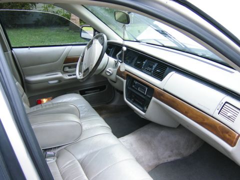 1992 Ford Crown Victoria - Interior view of a 1992 Ford Crown Victoria, highlighting its spacious cabin and classic design elements.