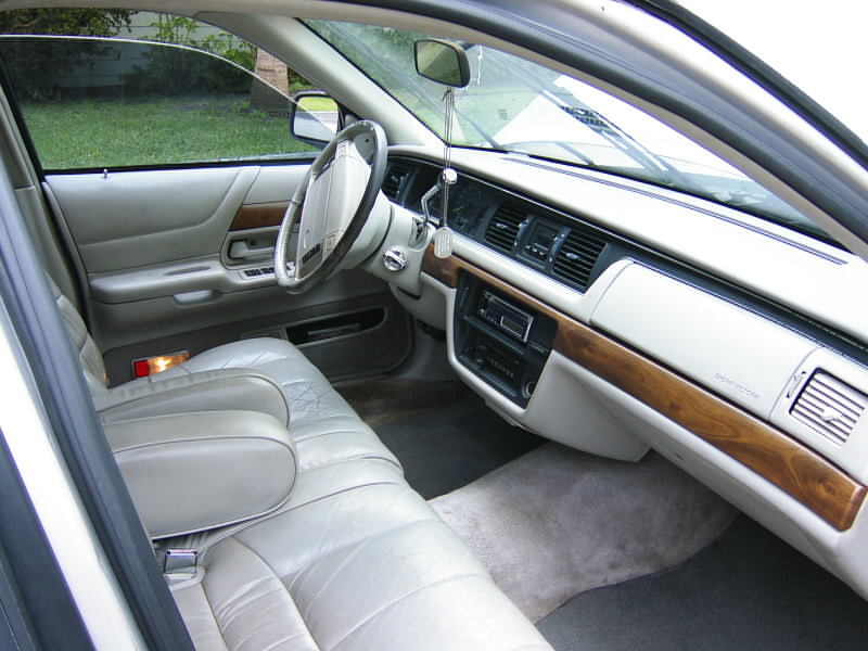 1992 Ford Crown Victoria interior showing leather seats, dashboard, steering wheel, and center console