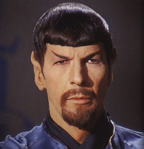 1991 Ford Crown Victoria - A close-up portrait of Spock from Star Trek, his distinctive Vulcan features and uniform.