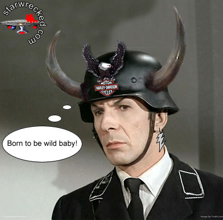 1991 Ford Crown Victoria - This image shows a man in a costume helmet with added horns and a Harley-Davidson logo.