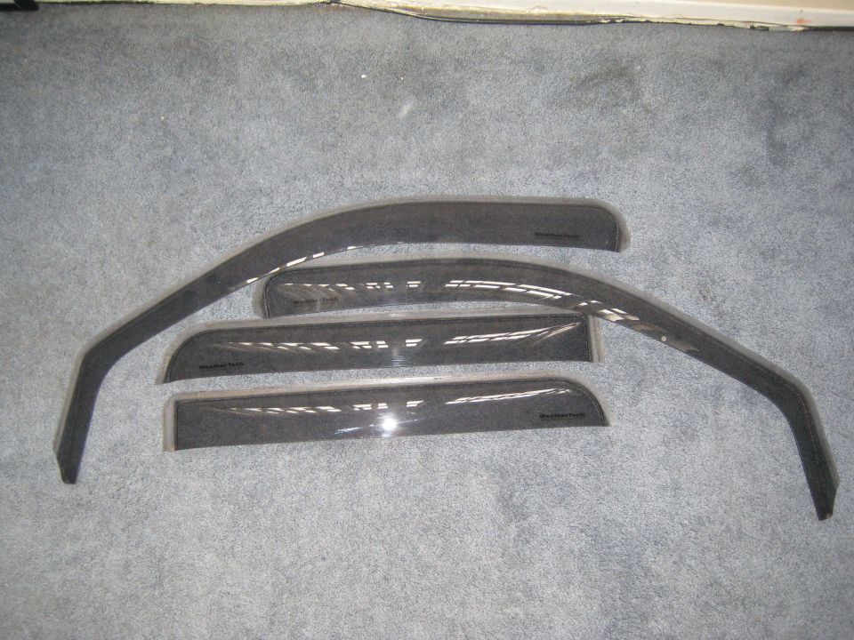 WeatherTech In-channel vent visors
pretty much perfect condition