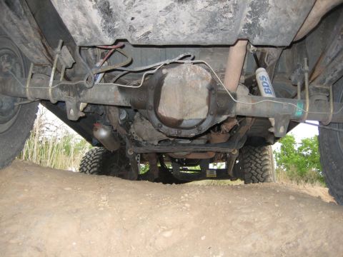 1996 Ford Bronco - Underside view of a 1996 Ford Bronco, highlighting the rear axle and suspension components.