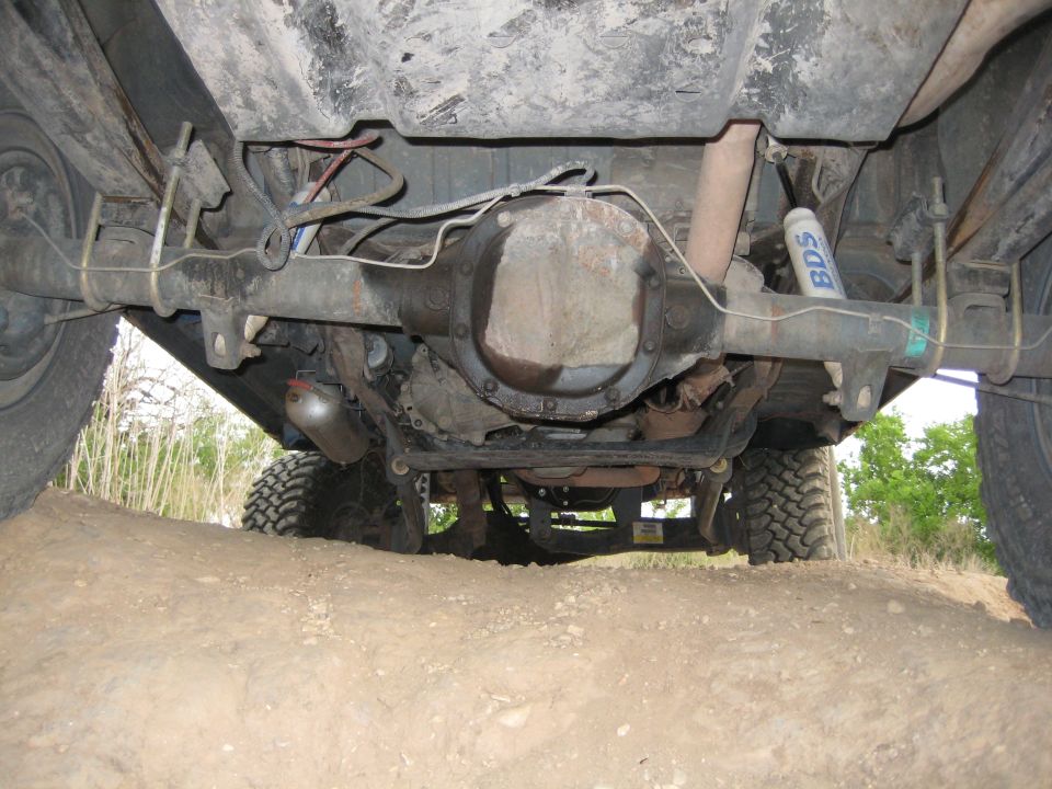 Underside view of a 1996 Ford Bronco showing rear axle, differential, and BDS shocks