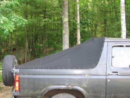 1993 Ford Bronco - Custom made boat canvas Fastback style soft top, no rear window. Snaps attached to body.