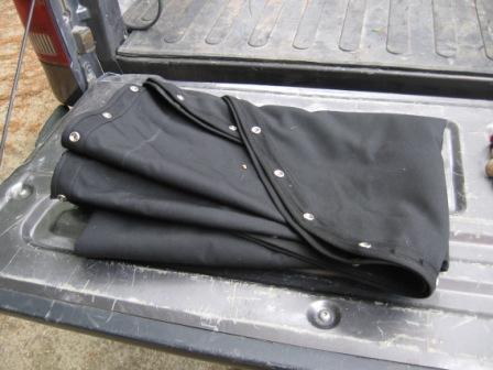 1993 Ford Bronco - Custom made boat canvas Fastback style soft top, no rear window. Snaps attached to body. Top all folded up.