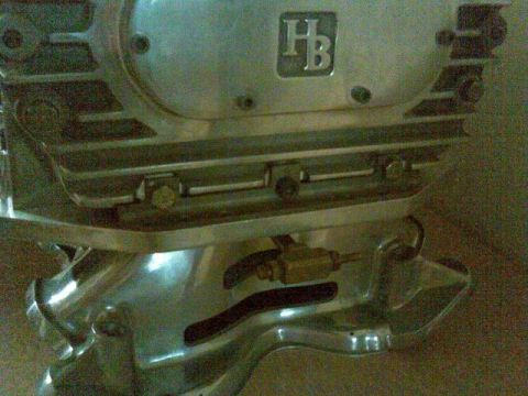 1972 Ford Ranchero - backfire valve is mounted under intake, slots are cut for pressure to escape
