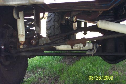 1979 Ford Bronco — Undercarriage view of vehicle suspension and steering components