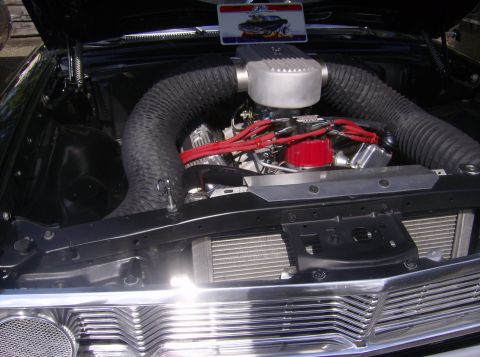 1970 Ford Ranchero - Custom engine bay of a 1970 Ford Ranchero with a large V8 and dual snorkel air intake.