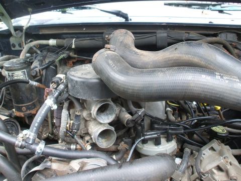 1990 Ford Bronco - new wires, new rotor, spout view, new cap not on yet...etc