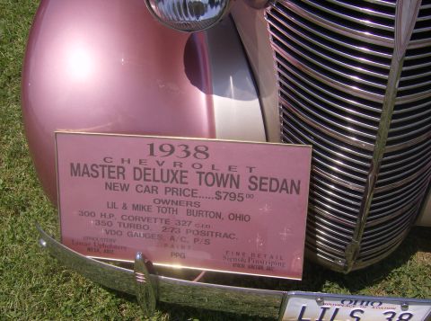 1970 Ford Ranchero - A pink vehicle is seen from the front, with a pink note affixed to its bumper.